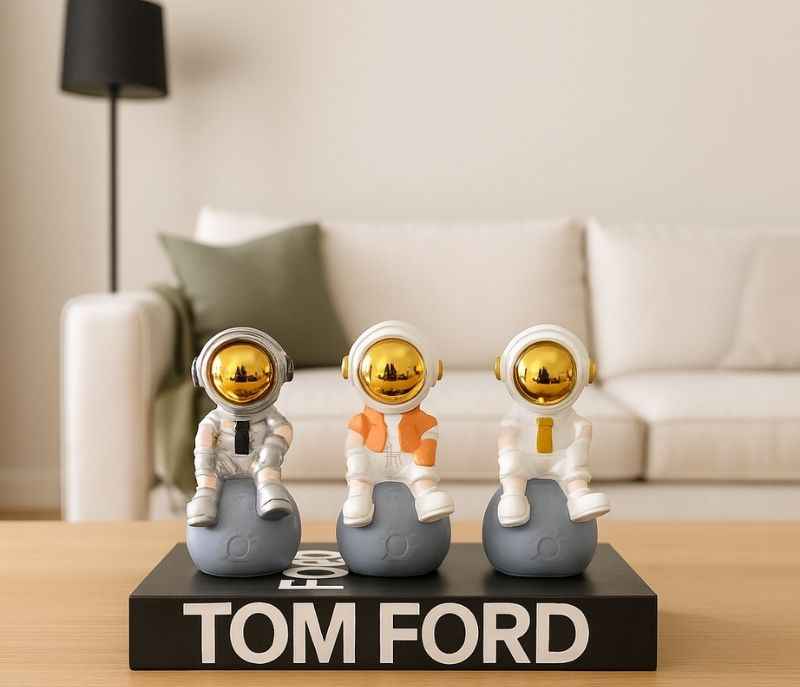 Image 1 for G-RA-03 A/B/C set of three decorative astronaut figurines white spacesuits with gold accents on the visors