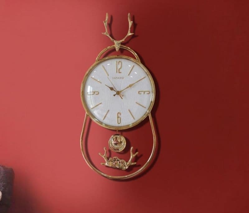 Image 1 for Sutton Minimal Transparent Reindeer Analog Pendulum Wall Clock